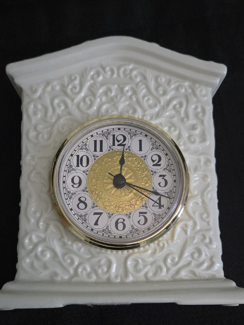 VINTAGE MERVINS WHITE PORCELAIN DESKTOP CLOCK.